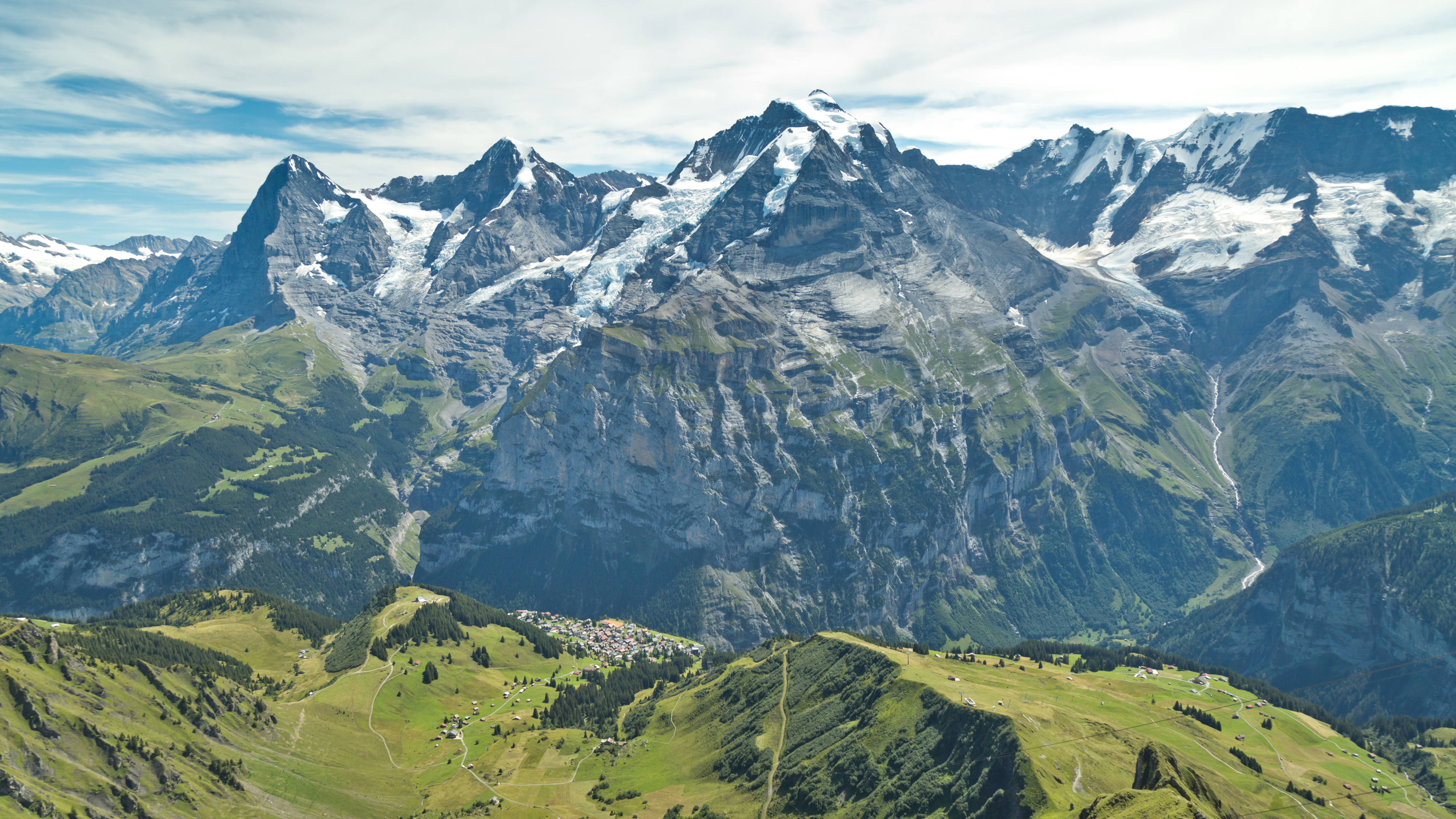 Near the Schilthorn summit overlooking the Eiger, Mönch, and Jungfrau peaks, Berner Oberland, Switzerland.